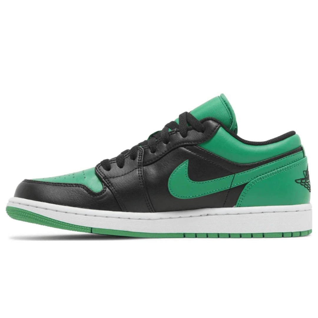 Air Jordan 1 Low Black Lucky Green sneakers on feet Dubai