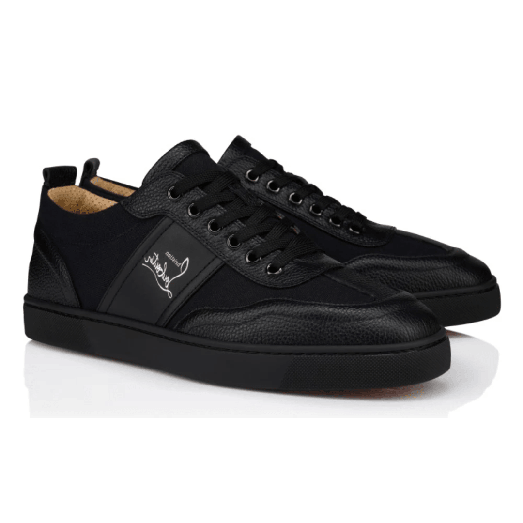 Christian Louboutin Retero Grained Calf Leather Black sneakers on feet Dubai