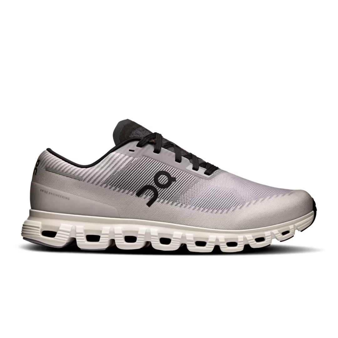 White running shoe with black accents on a white background