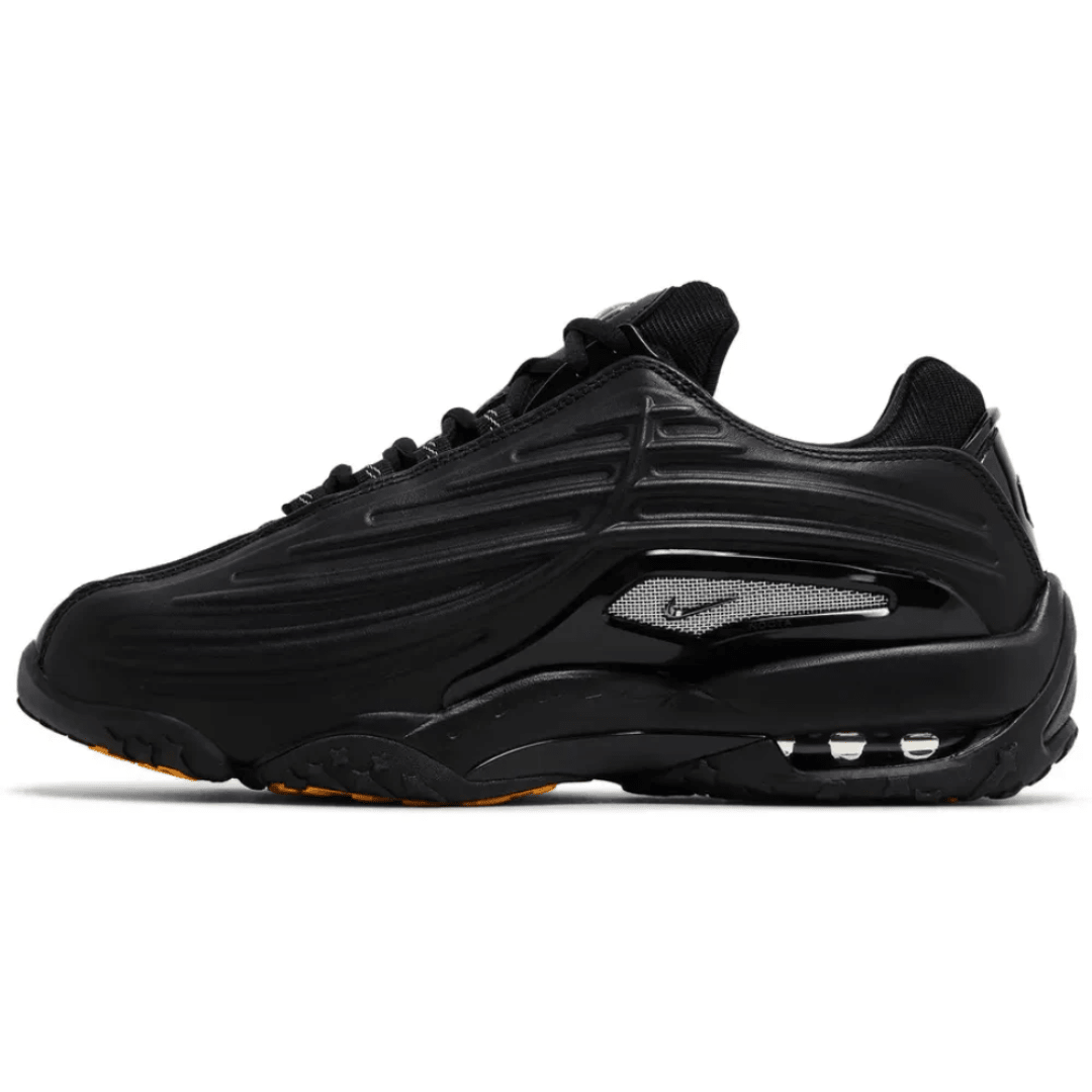 Nike NOCTA x Hot Step 2 Black sneakers on feet Dubai