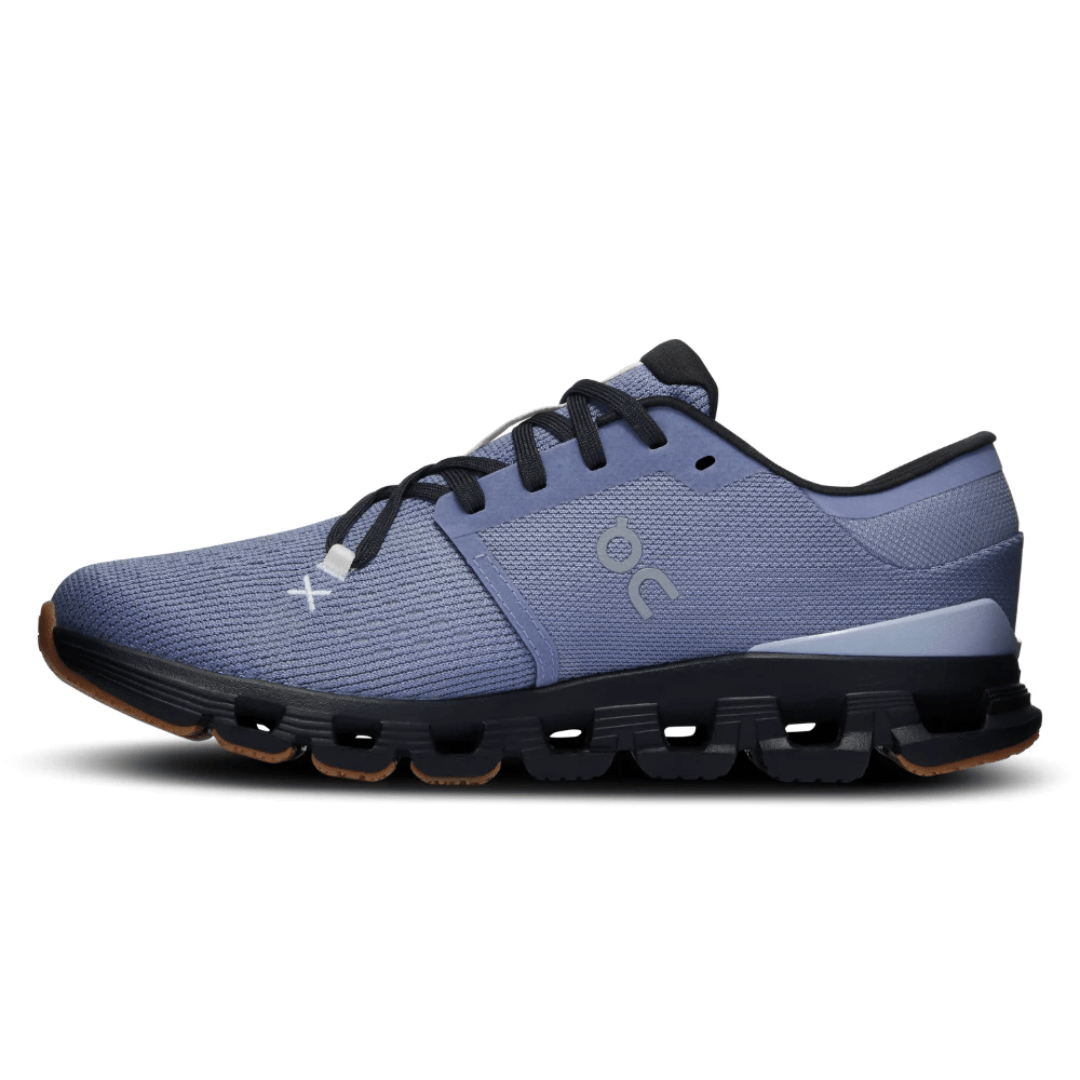 On Cloud X 4 Feather Black on feet Dubai